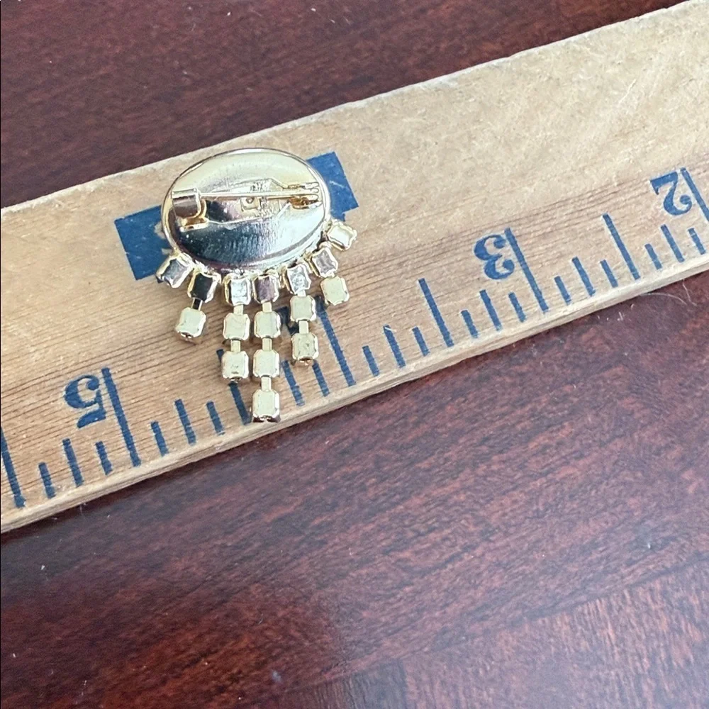 Vintage gold tone rhinestones brooch